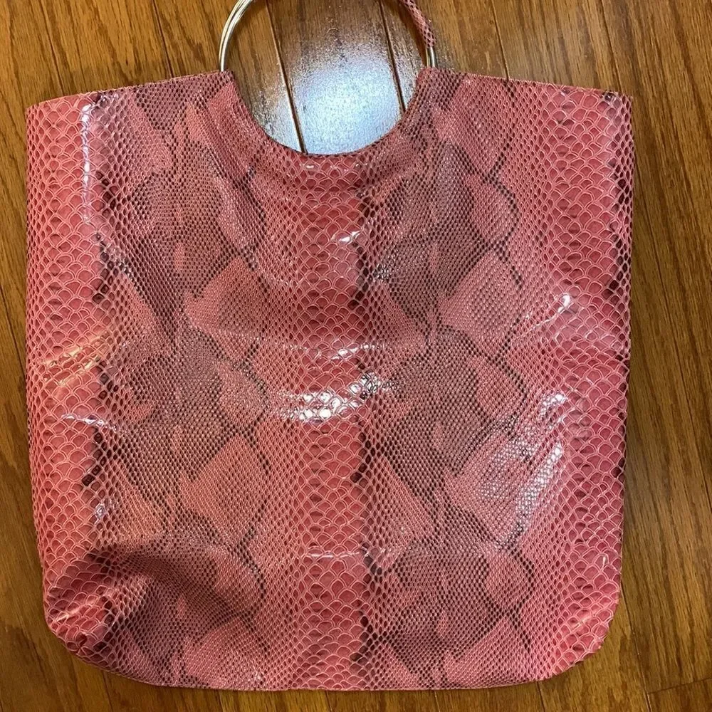 Kim Kardashian pink tote in faux snake print